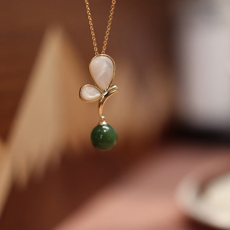 Ensemble de bijoux calmes en jade cyan et papillon tridacna