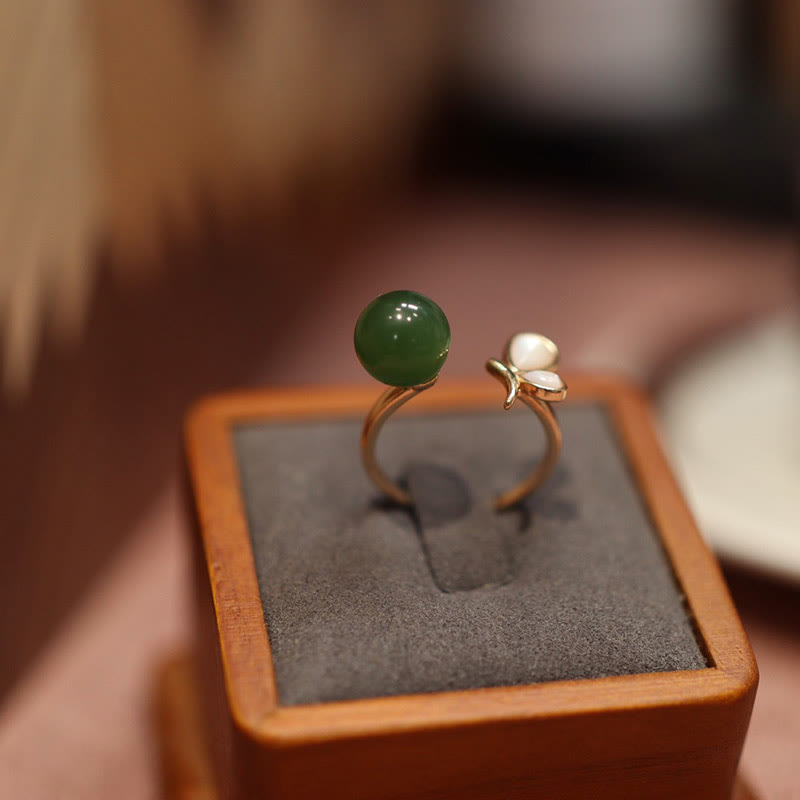 Ensemble de bijoux calmes en jade cyan et papillon tridacna