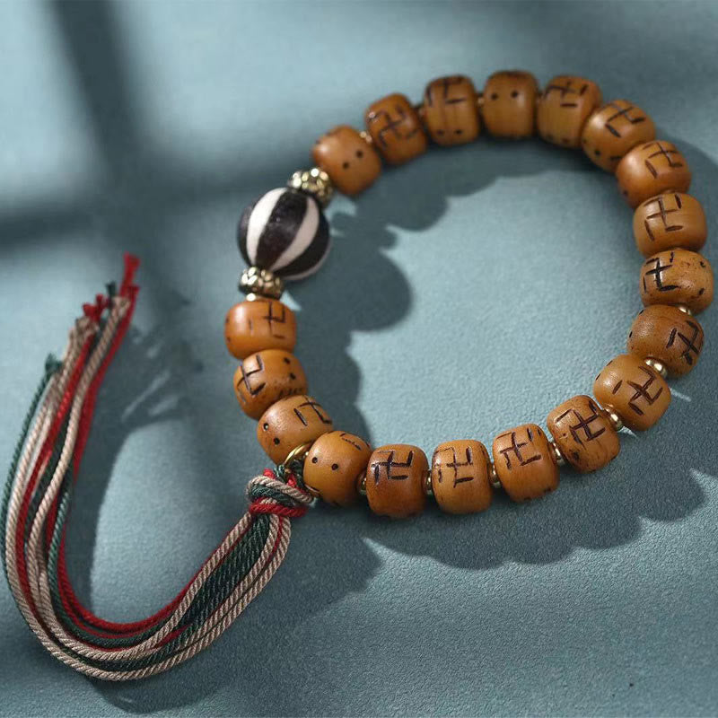 Bracelet Bouddha Dzi Swastika en os de chameau pour la chance et la protection