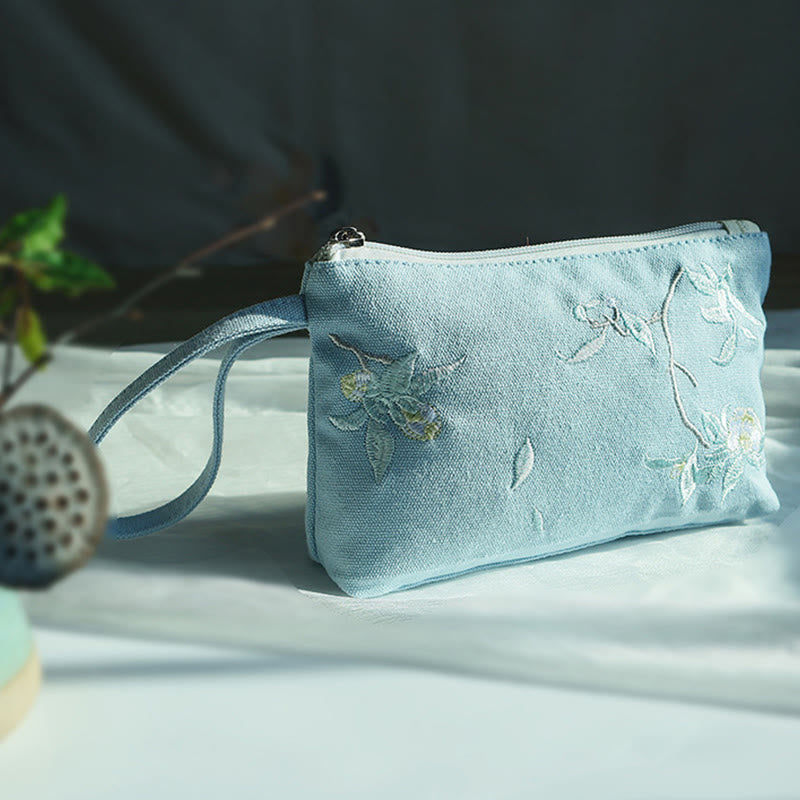 Portefeuille en toile avec broderie grue prune cerise | Compact 21 x 13 cm