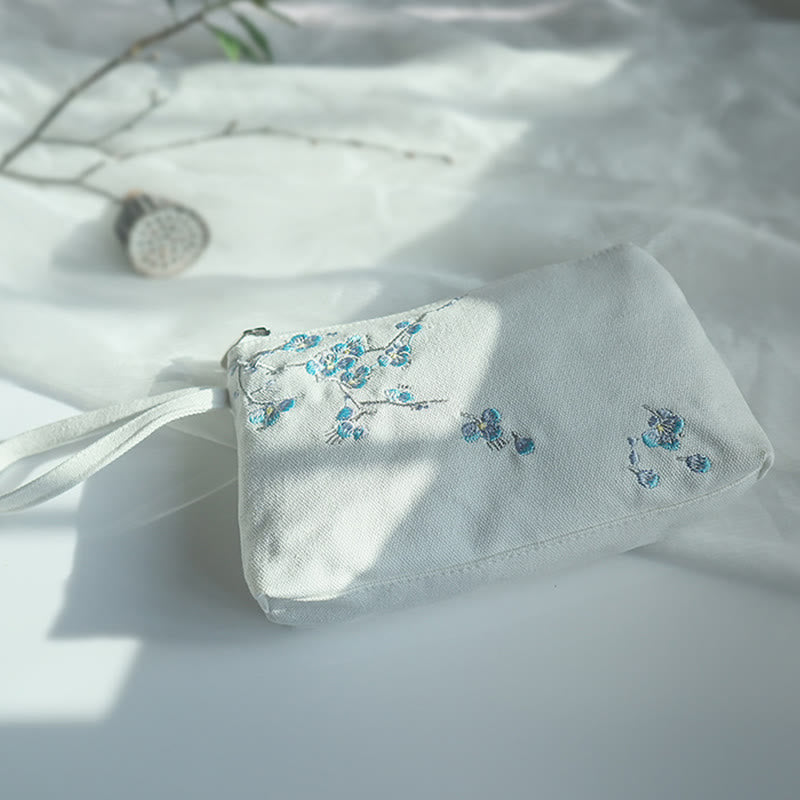 Portefeuille en toile avec broderie grue prune cerise | Compact 21 x 13 cm