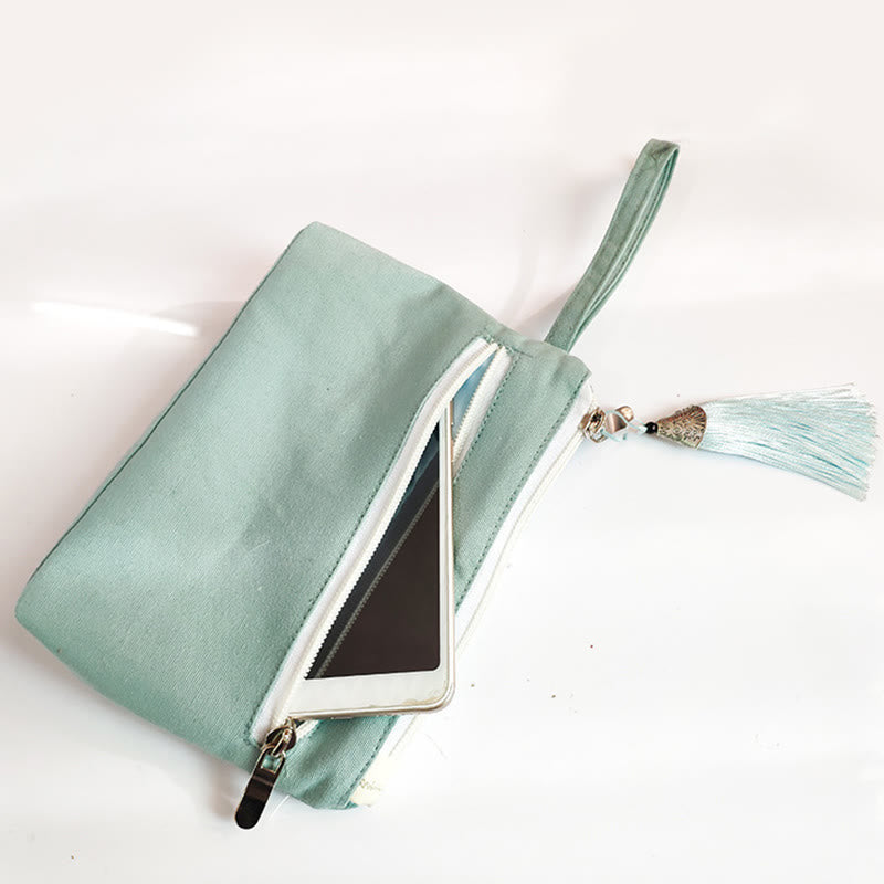 Portefeuille en toile avec broderie grue prune cerise | Compact 21 x 13 cm