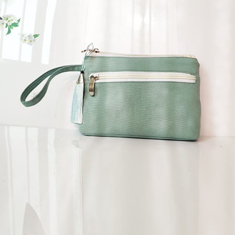 Portefeuille en toile avec broderie grue prune cerise | Compact 21 x 13 cm