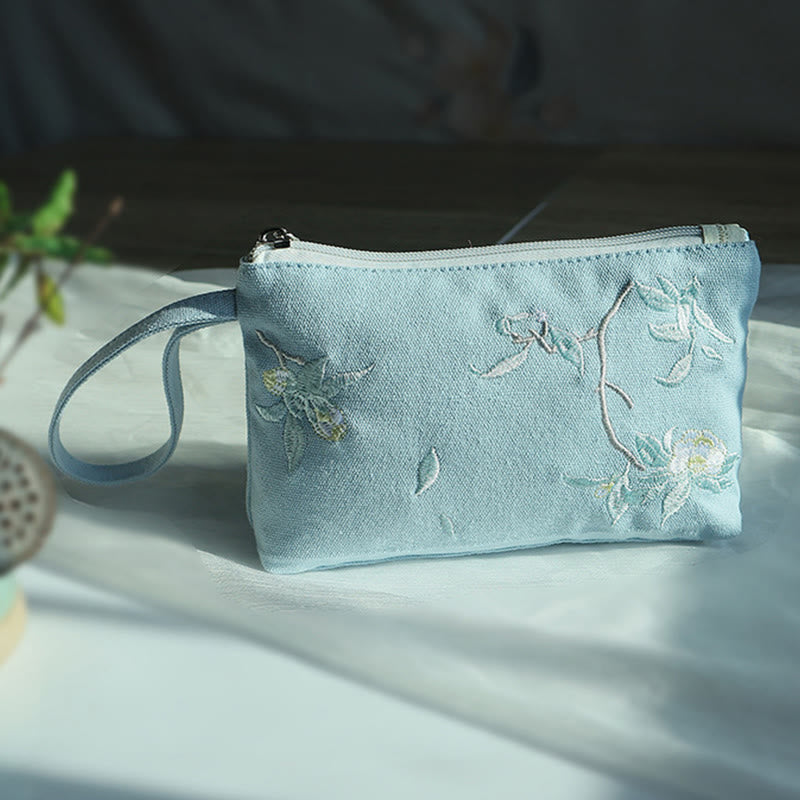 Portefeuille en toile avec broderie grue prune cerise | Compact 21 x 13 cm