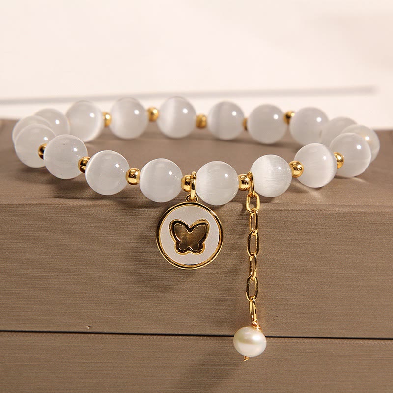 Bracelet spirituel à breloques œil de chat et papillon pour la paix et l'amour