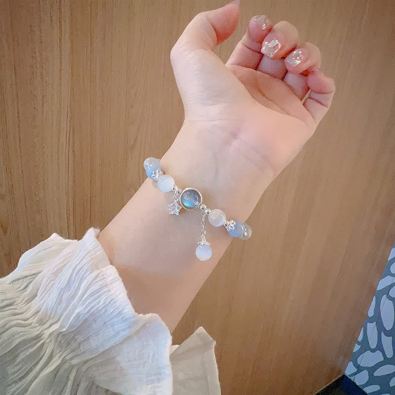 Bracelet œil de chat en pierre de lune avec breloque papillon ou étoile pour l'équilibre