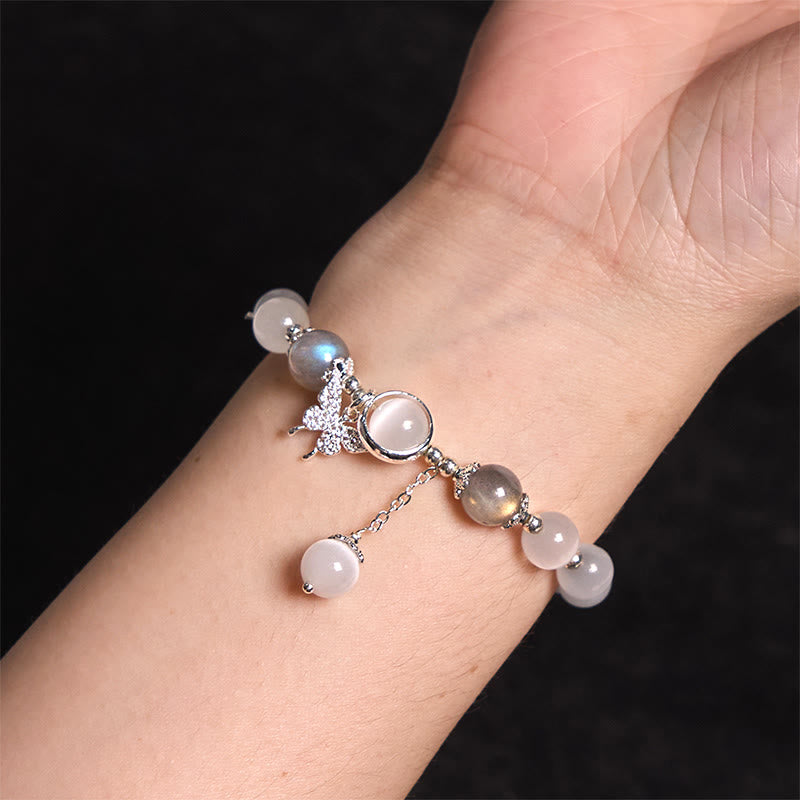 Bracelet œil de chat en pierre de lune avec breloque papillon ou étoile pour l'équilibre