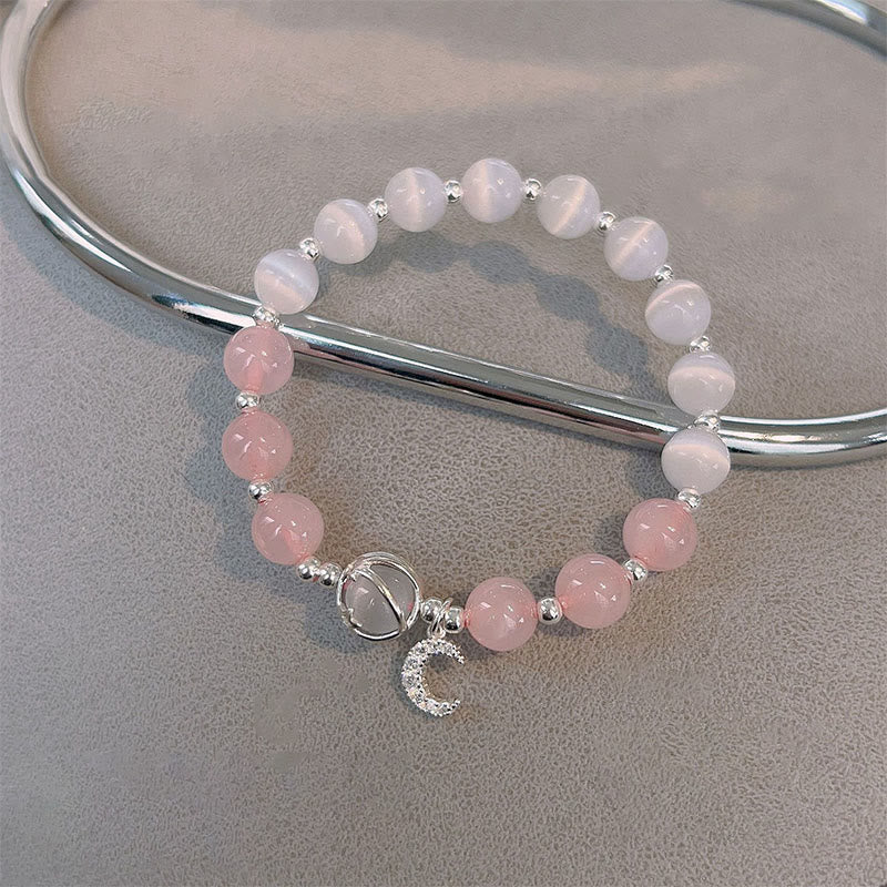Bracelet spirituel avec breloque lune et cristal rose œil de chat