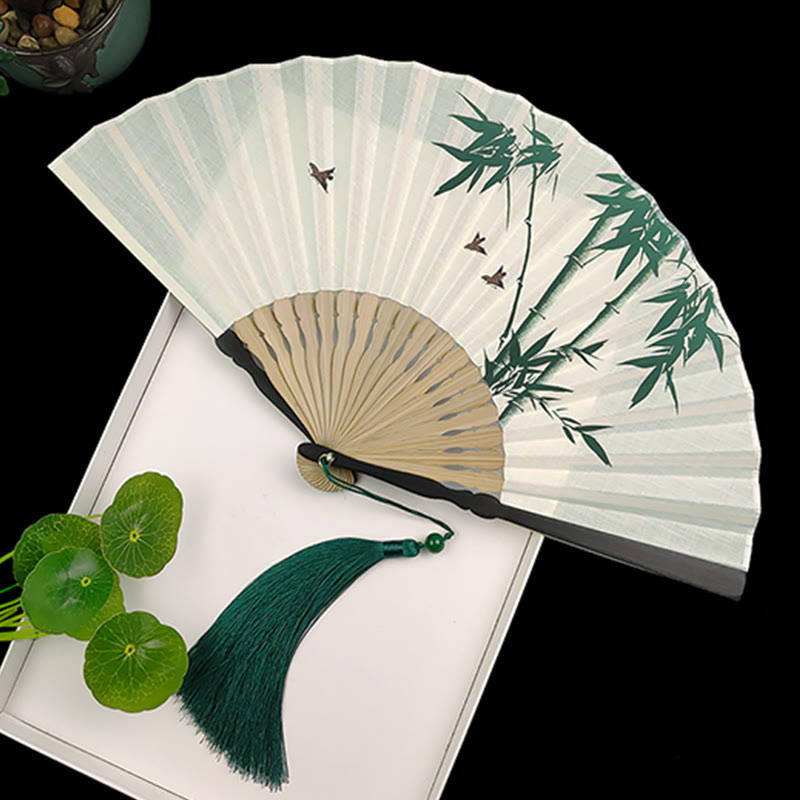 Éventail chinois pliable à motifs de bambou et de carpes koï