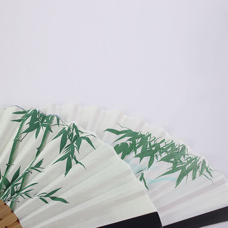 Éventail chinois pliable à motifs de bambou et de carpes koï
