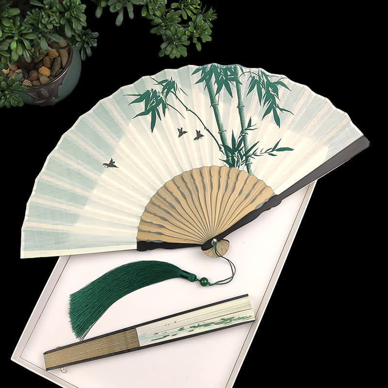 Éventail chinois pliable à motifs de bambou et de carpes koï
