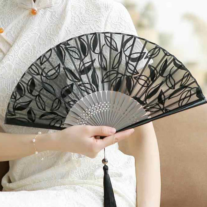 Éventail chinois pliable rétro en bambou et soie avec feuilles et fleurs