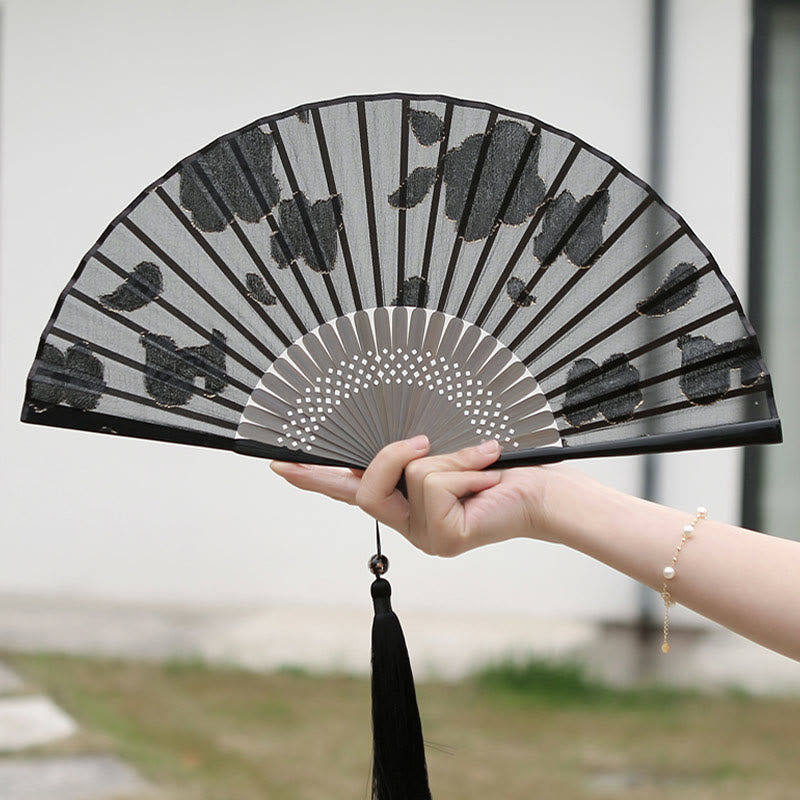 Éventail chinois pliable rétro en bambou et soie avec feuilles et fleurs