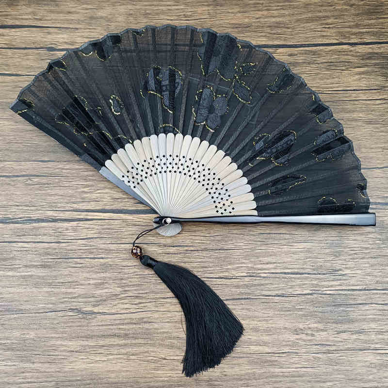 Éventail chinois pliable rétro en bambou et soie avec feuilles et fleurs