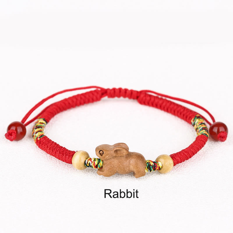 Bracelet porte-bonheur du zodiaque chinois avec cordon rouge et bois de pêcher