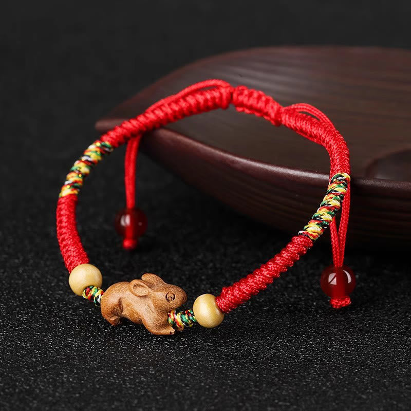Bracelet porte-bonheur du zodiaque chinois avec cordon rouge et bois de pêcher