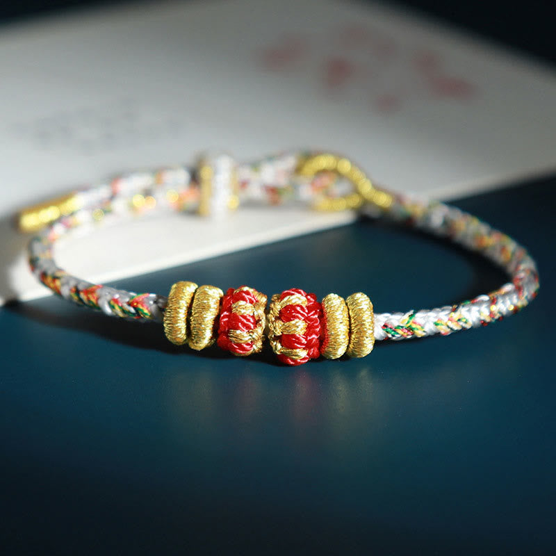 Bracelet porte-bonheur en fil coloré avec Bouddha du zodiaque chinois