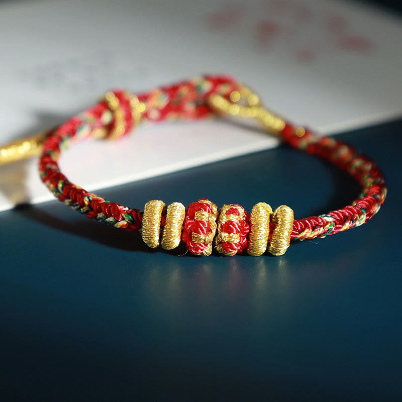 Bracelet porte-bonheur en fil coloré avec Bouddha du zodiaque chinois