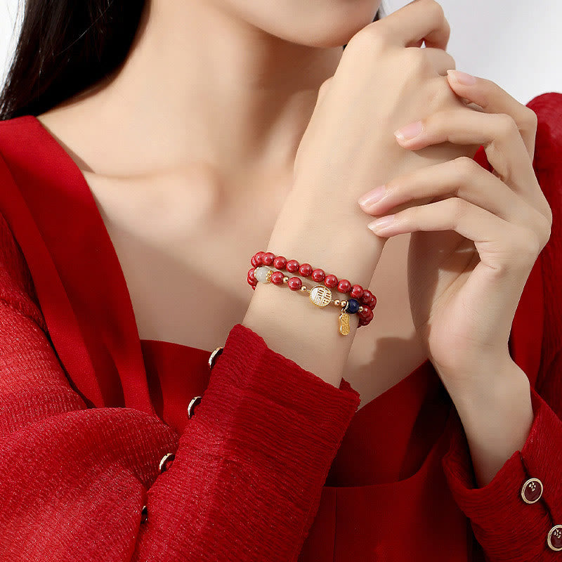 Bracelet en cinabre avec caractère Fu et pierre Tridacna