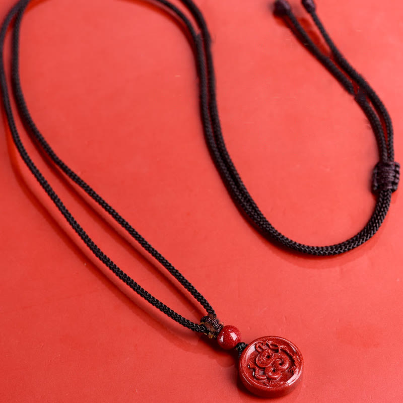 Collier du zodiaque chinois en cinabre pour le calme et l'équilibre