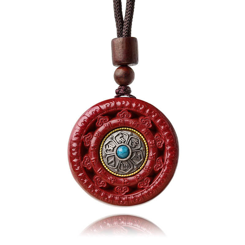 Collier pendentif rotatif et porte-clés Cinabre Om Mani Padme Hum