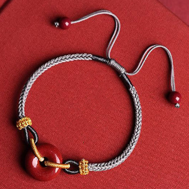 Bracelet en corde tressée avec boucle de paix en cinabre pour la protection