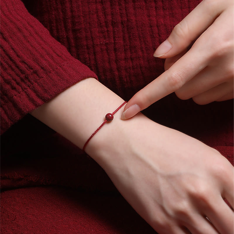 Bracelet de bénédiction en fil rouge cinabre et agate rouge