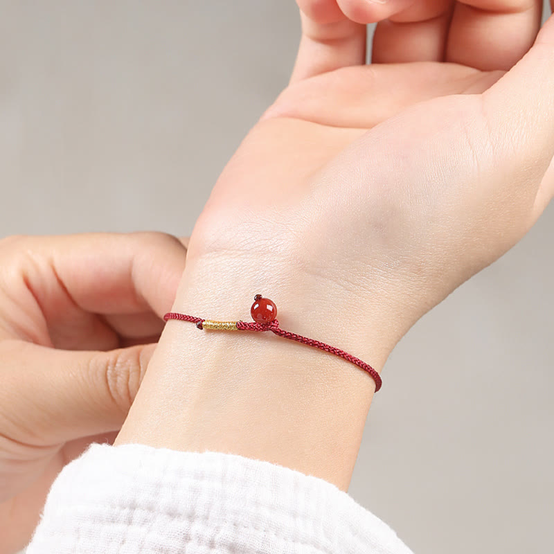 Bracelet de bénédiction en fil rouge cinabre et agate rouge