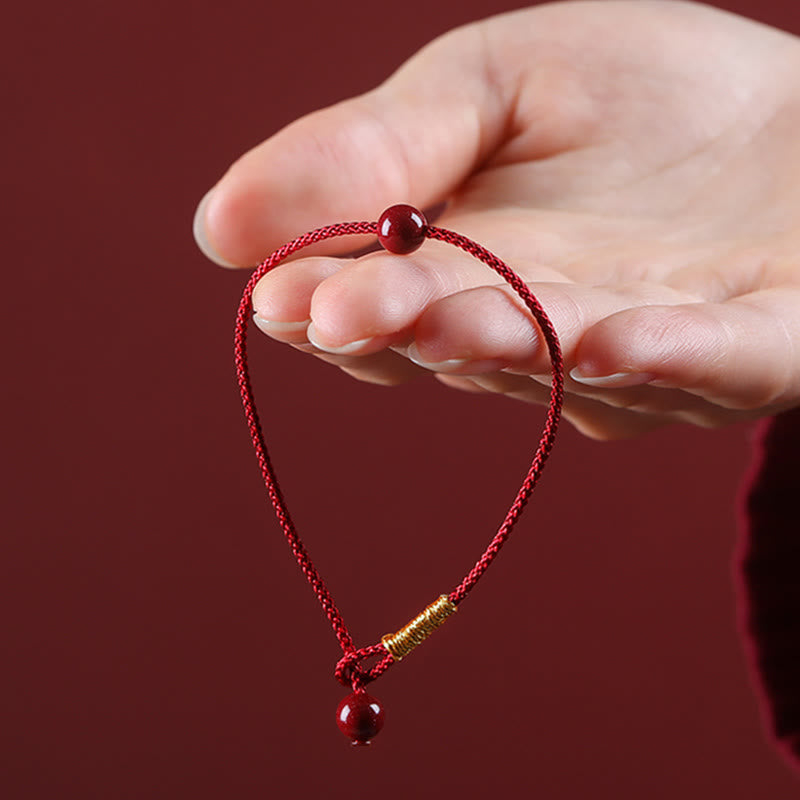 Bracelet de bénédiction en fil rouge cinabre et agate rouge