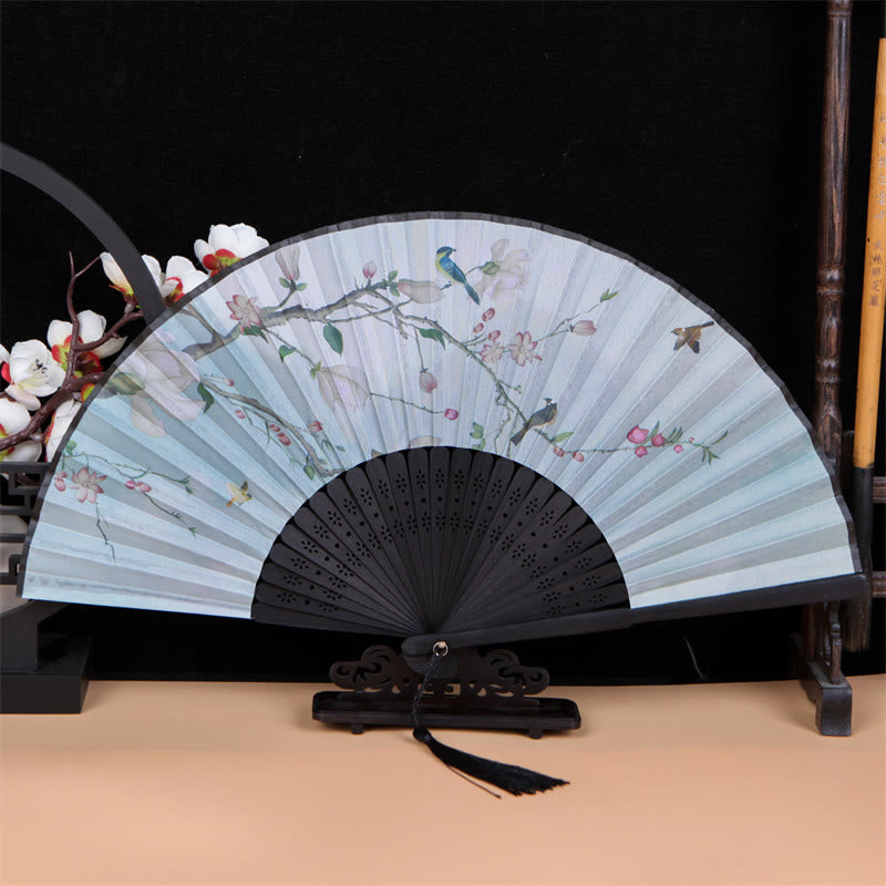 Éventail pliant en bambou classique avec oiseaux et fleurs chantantes