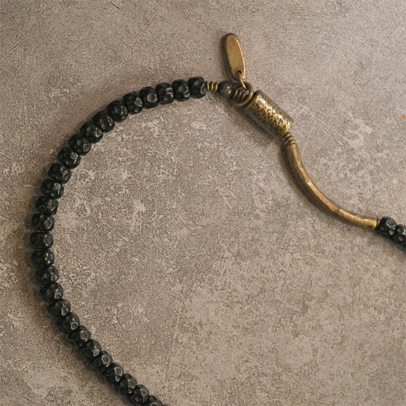 Bracelet spirituel triple tour en cuivre et coquille de noix de coco