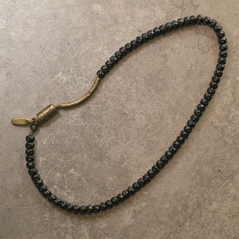 Bracelet spirituel triple tour en cuivre et coquille de noix de coco