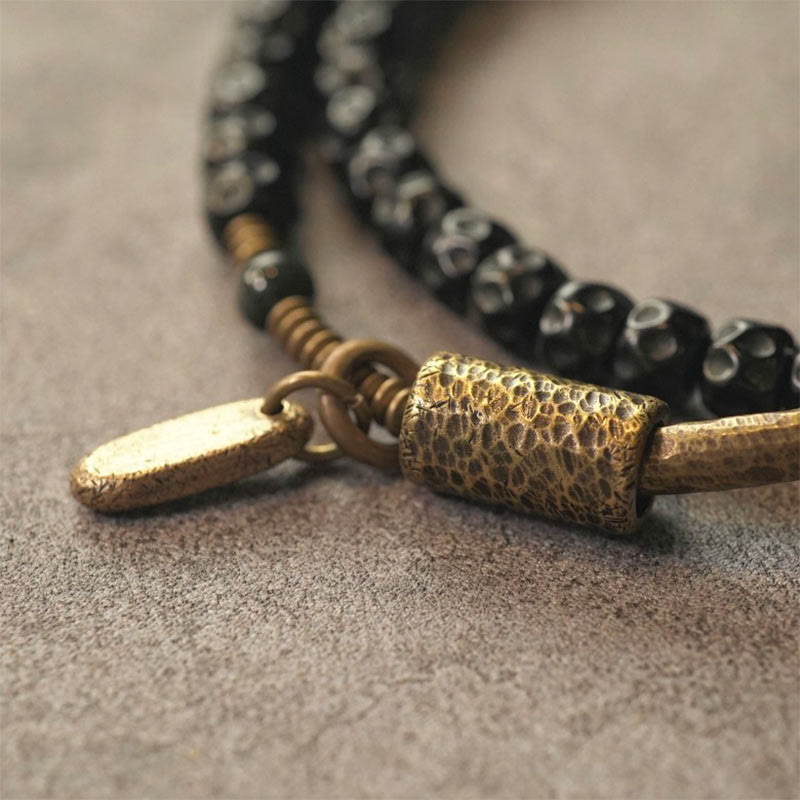 Bracelet spirituel triple tour en cuivre et coquille de noix de coco