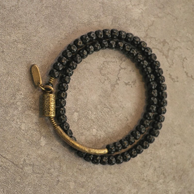 Bracelet spirituel triple tour en cuivre et coquille de noix de coco