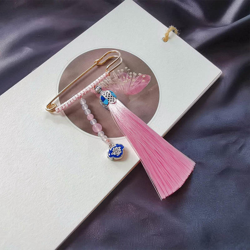 Broche à pompons en perles de calcédoine colorées pour une énergie positive