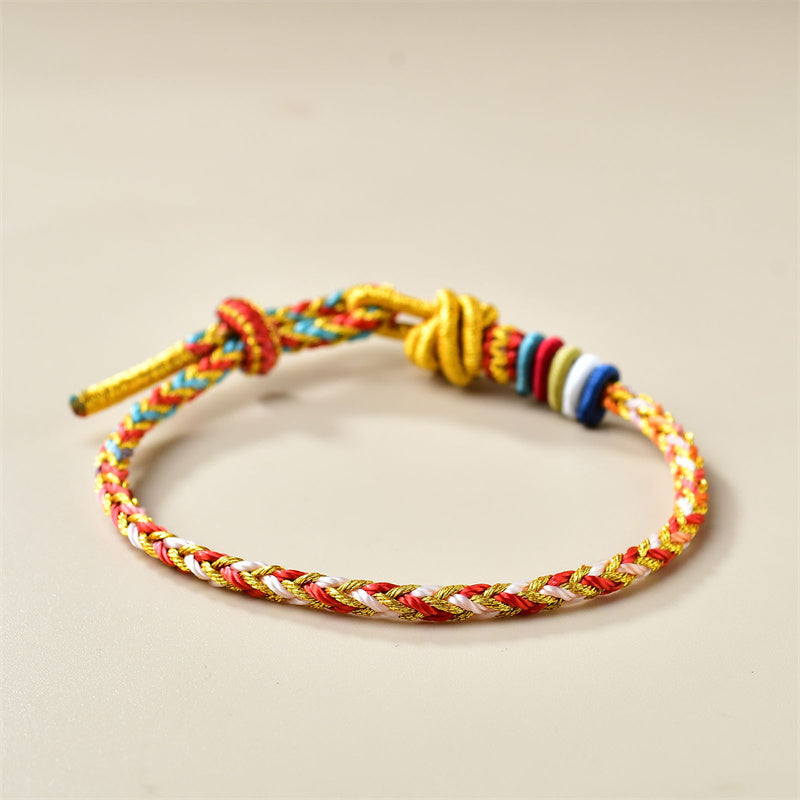 Bracelet en fil rouge doré coloré pour la guérison et l'équilibre