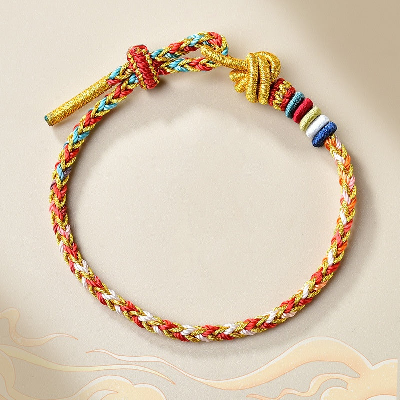 Bracelet en fil rouge doré coloré pour la guérison et l'équilibre
