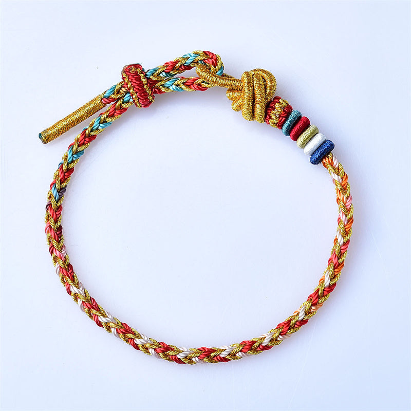 Bracelet en fil rouge doré coloré pour la guérison et l'équilibre
