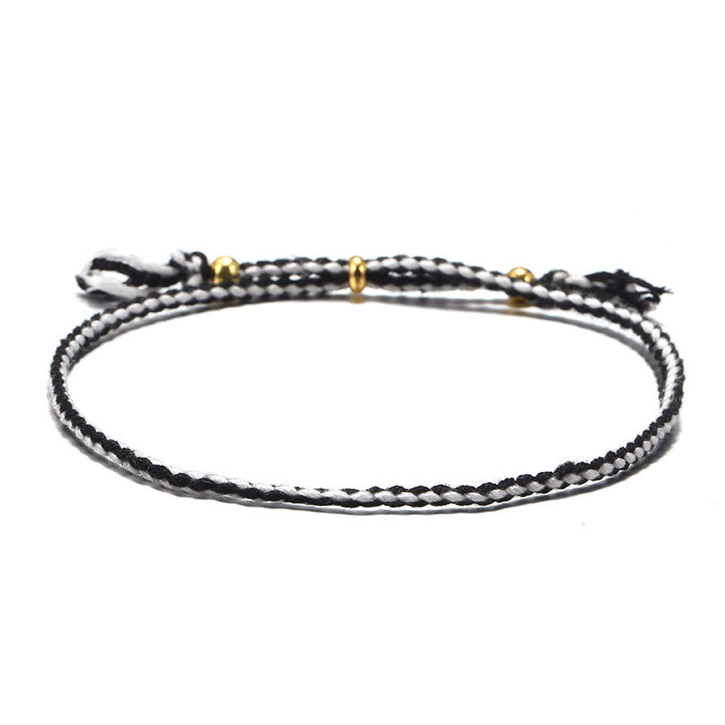 Bracelet d'harmonie coloré fait main avec pompon en corde réglable