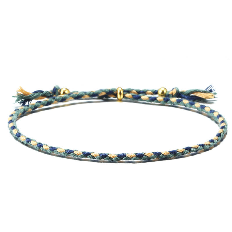 Bracelet d'harmonie coloré fait main avec pompon en corde réglable