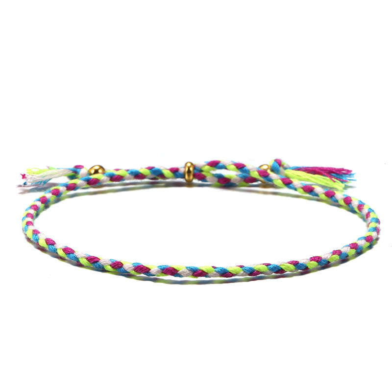 Bracelet d'harmonie coloré fait main avec pompon en corde réglable