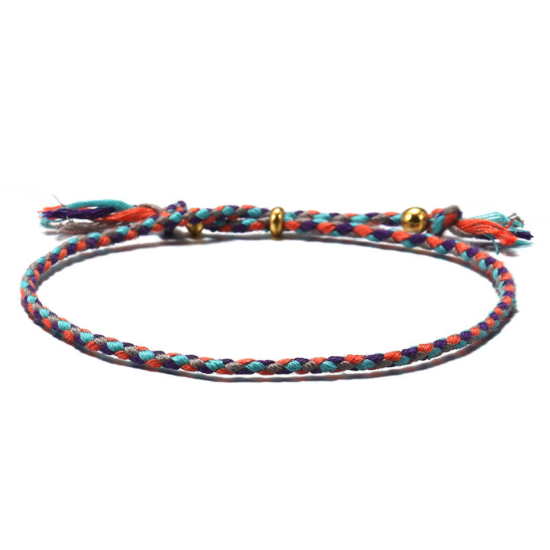 Bracelet d'harmonie coloré fait main avec pompon en corde réglable