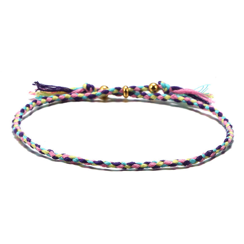 Bracelet d'harmonie coloré fait main avec pompon en corde réglable
