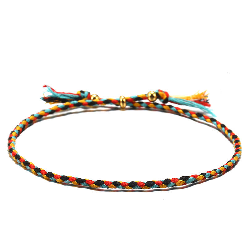 Bracelet d'harmonie coloré fait main avec pompon en corde réglable