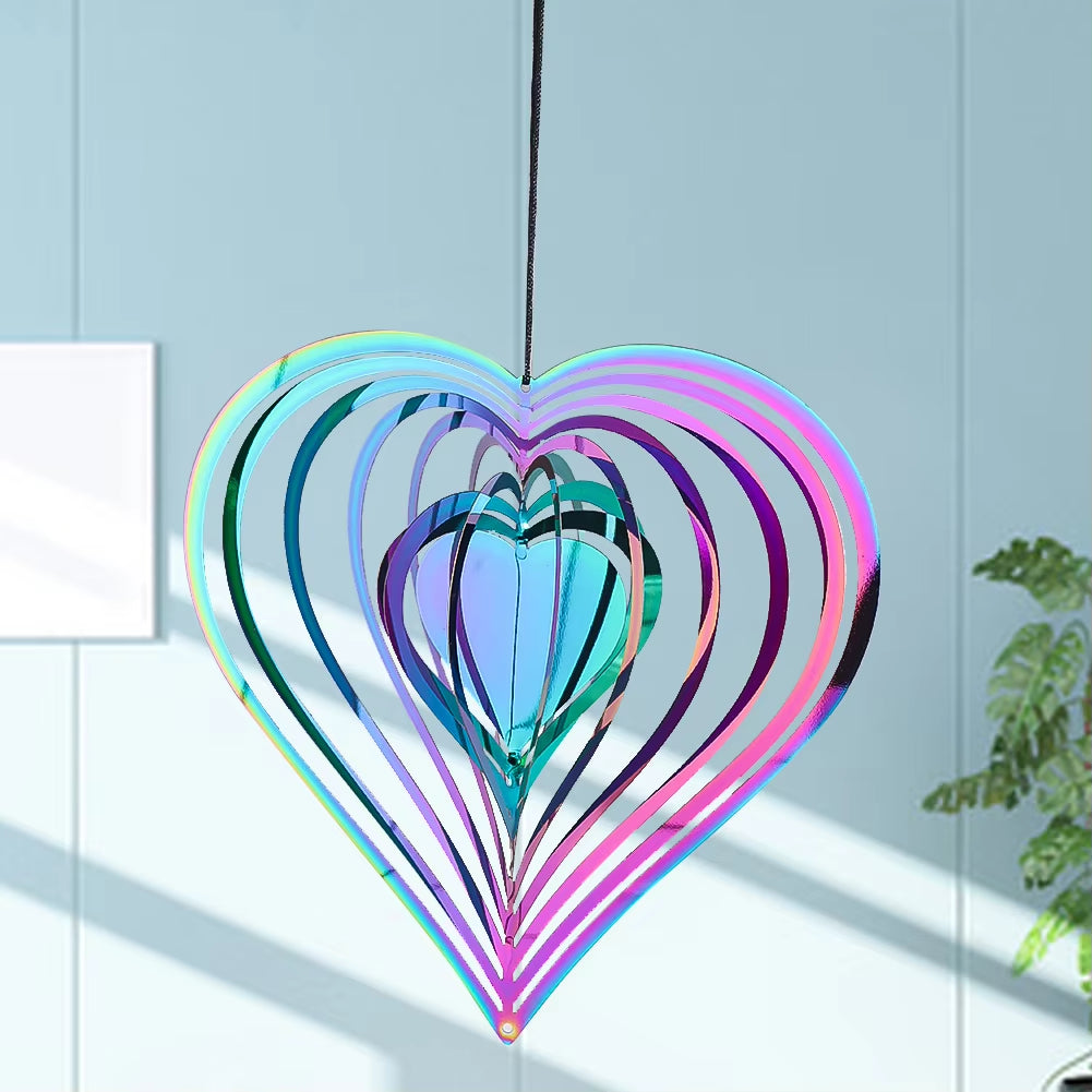 Iridescent metal heart wind spinner with concentric shapes for garden decor