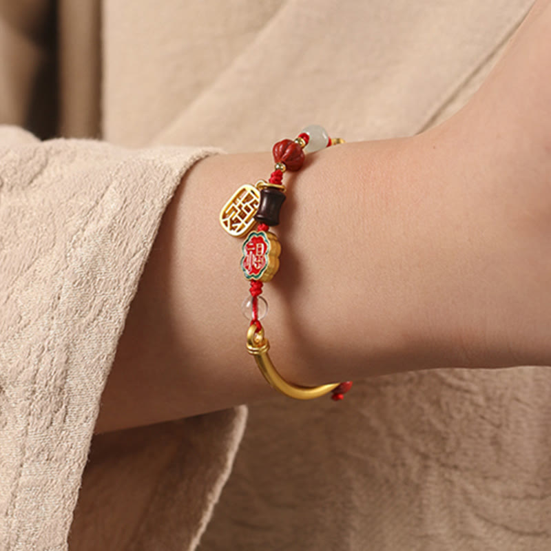 Bracelet de richesse en cuivre avec nuages ​​de bon augure pour la chance et la prospérité