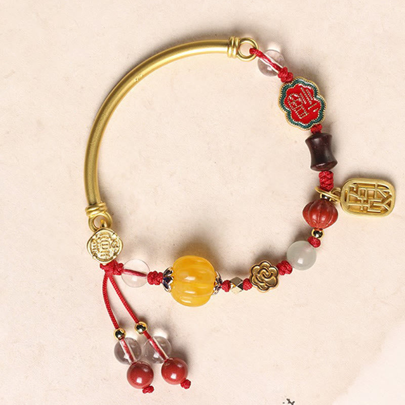 Bracelet de richesse en cuivre avec nuages ​​de bon augure pour la chance et la prospérité