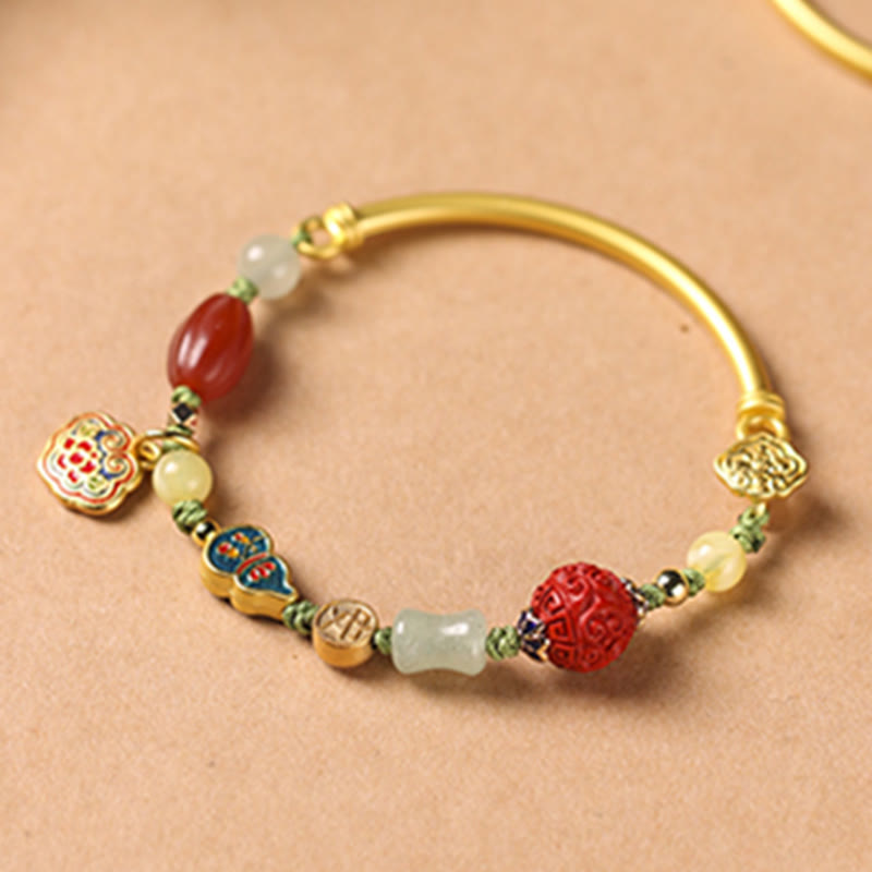 Bracelet de richesse en cuivre avec nuages ​​de bon augure pour la chance et la prospérité
