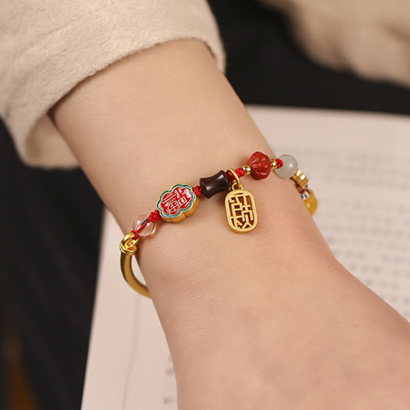 Bracelet de richesse en cuivre avec nuages ​​de bon augure pour la chance et la prospérité