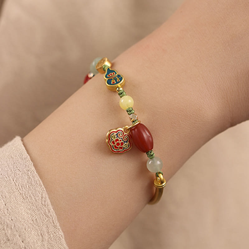 Bracelet de richesse en cuivre avec nuages ​​de bon augure pour la chance et la prospérité
